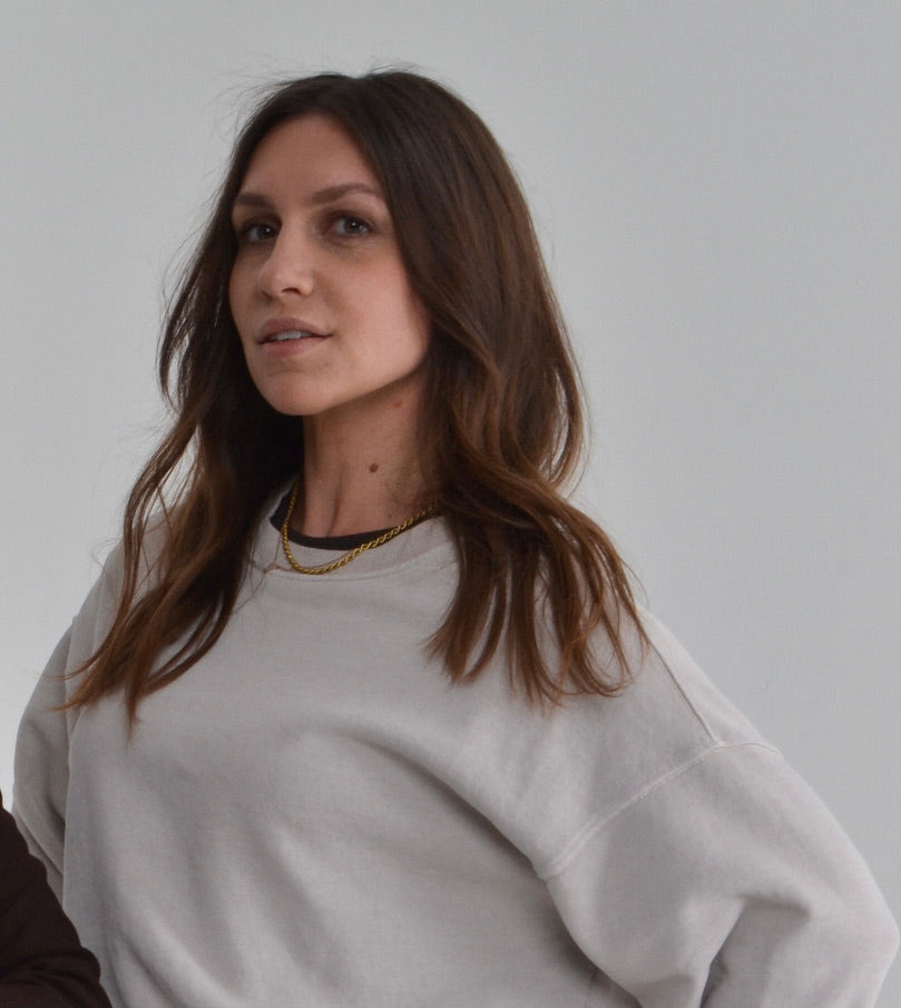 woman in organic cotton sweatshirt