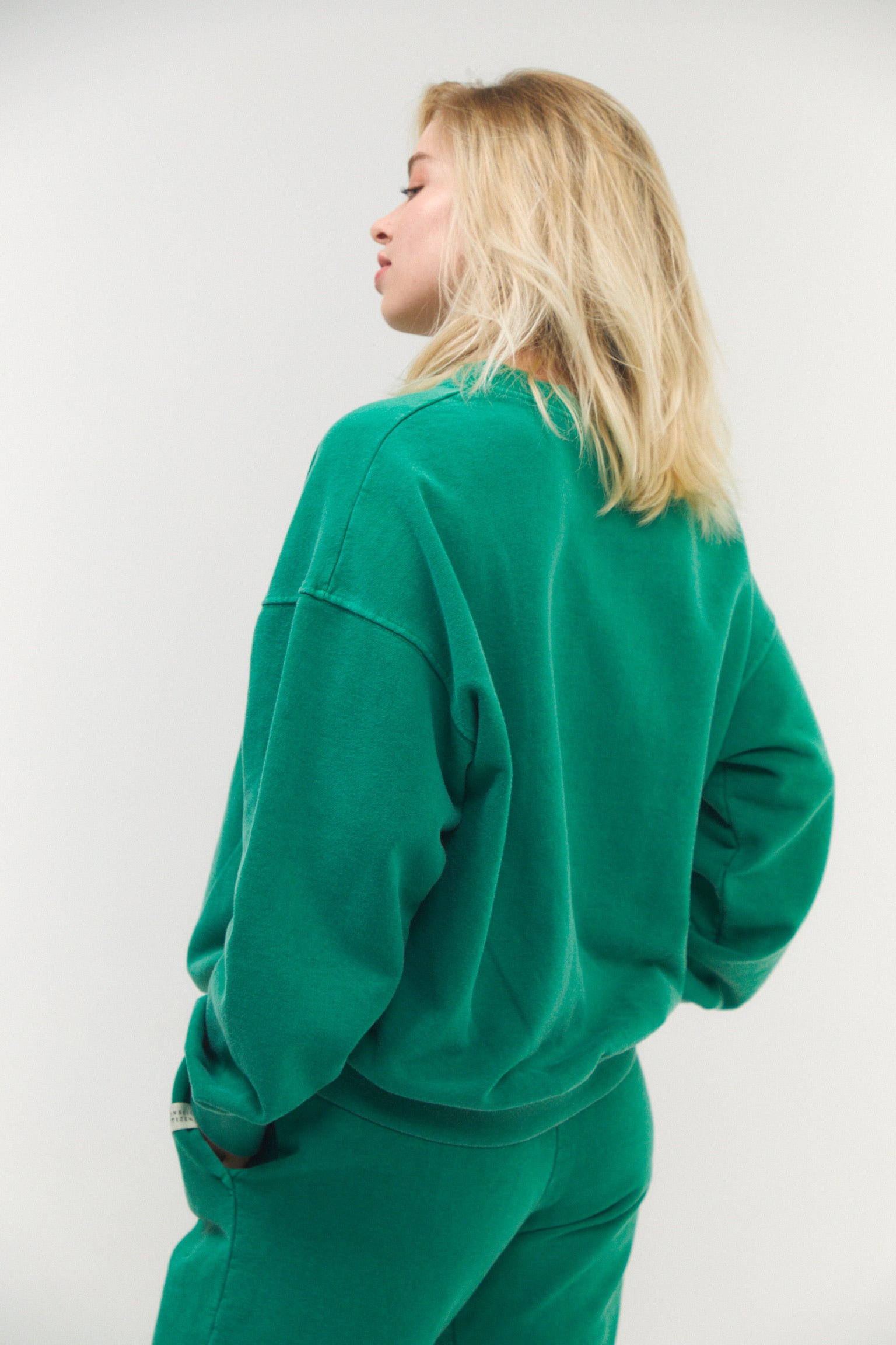  Indulge in the comfort of a soft organic cotton sweatshirt, crafted with care for the planet