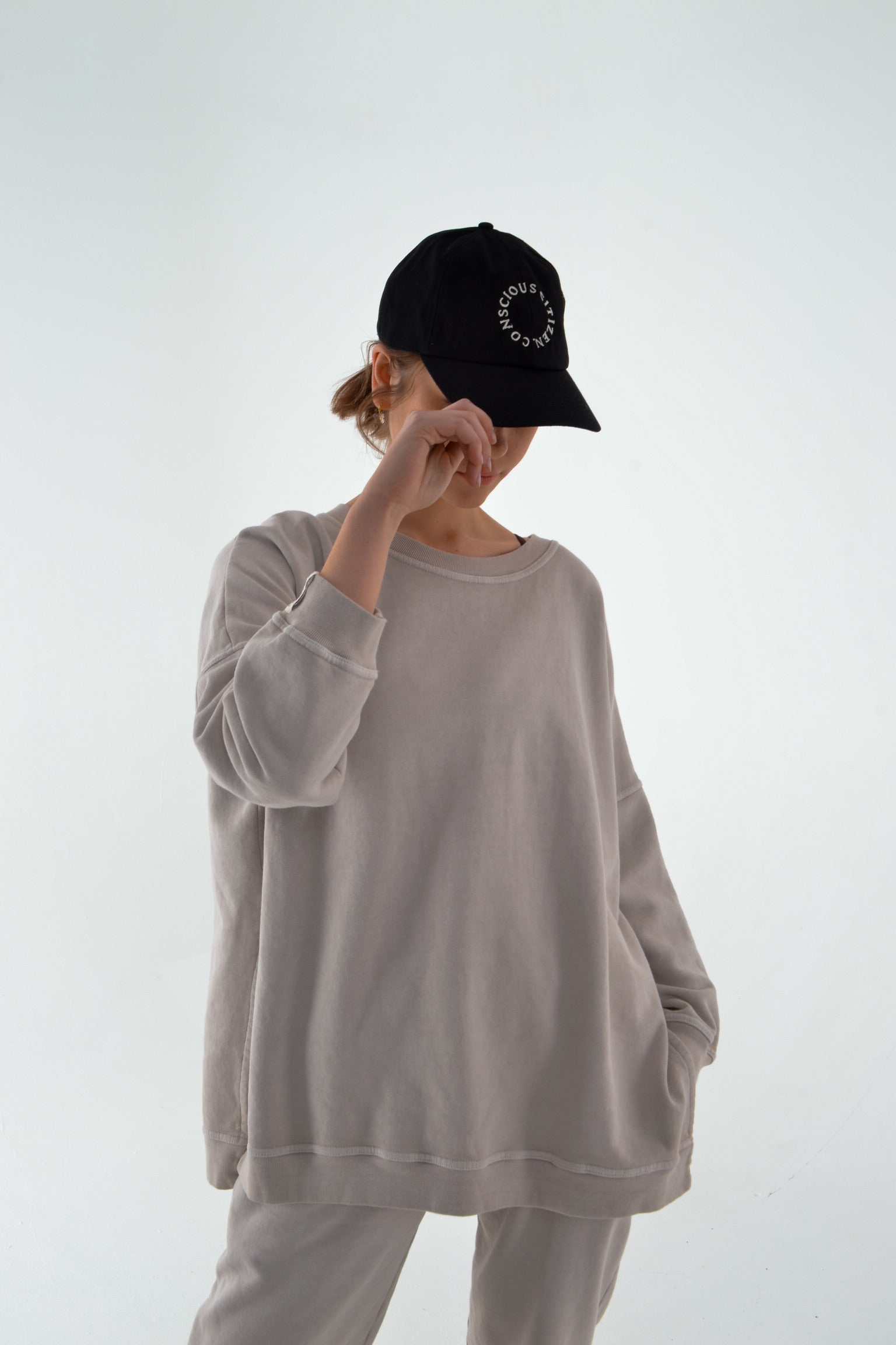 Indulge in the comfort of a soft organic cotton cap, crafted with care for the planet