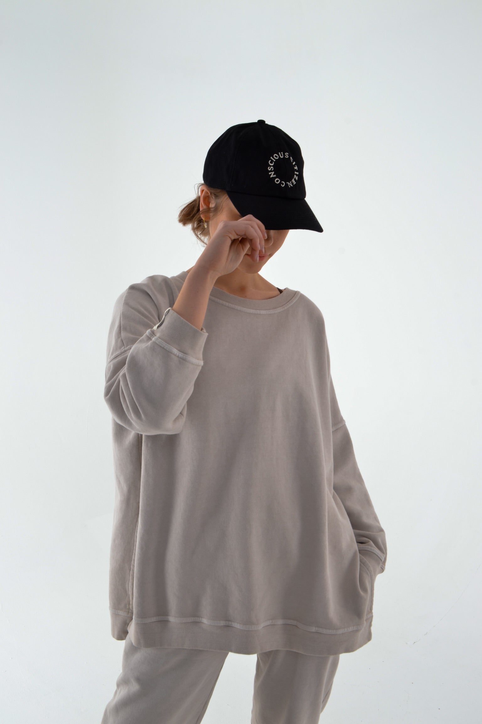  Indulge in the comfort of a soft organic cotton cap, crafted with care for the planet