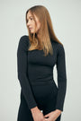Eco-friendly, recycled black long sleeve t-shirt made from 94% recycled nylon and 6% elastane